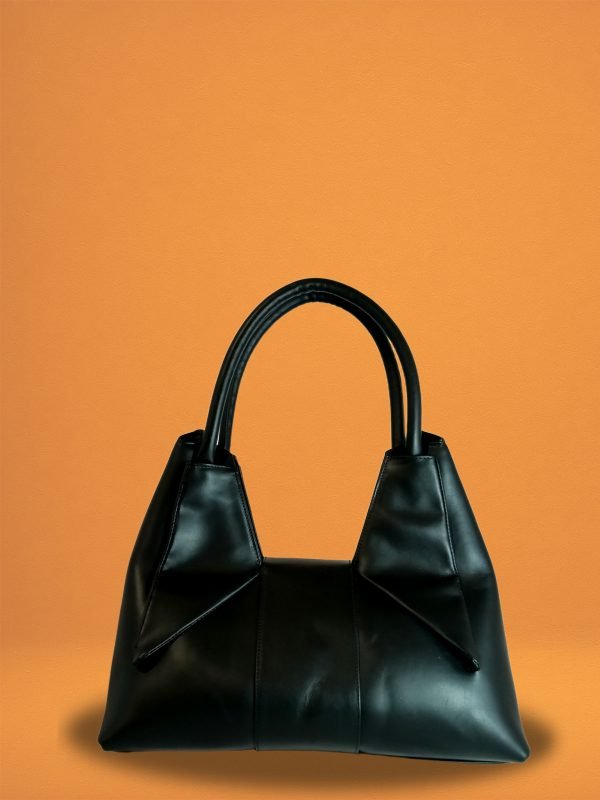 Back view of the Black Italian leather Miacontessa Dea handbag featuring a unique origami style geometric, folded design.