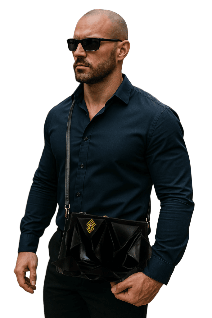 Bodyguard holding a Miacontessa Arte origami style handbag in obsidian black Italian leather, highlighting its unique, folded design that creates an illusionary or artful aesthetic.