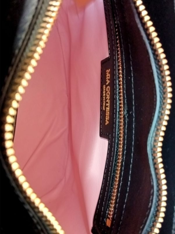 Inside view of Miacontessa Florella origami style handbag in obsidian black Italian leather, highlighting its unique, folded design that creates an illusionary or artful aesthetic.