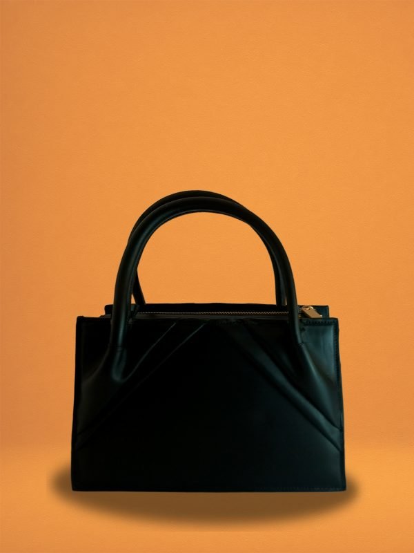 Back view of Miacontessa Florella Rosa origami style handbag in obsidian black Italian leather, highlighting its unique, folded design that creates an illusionary or artful aesthetic.